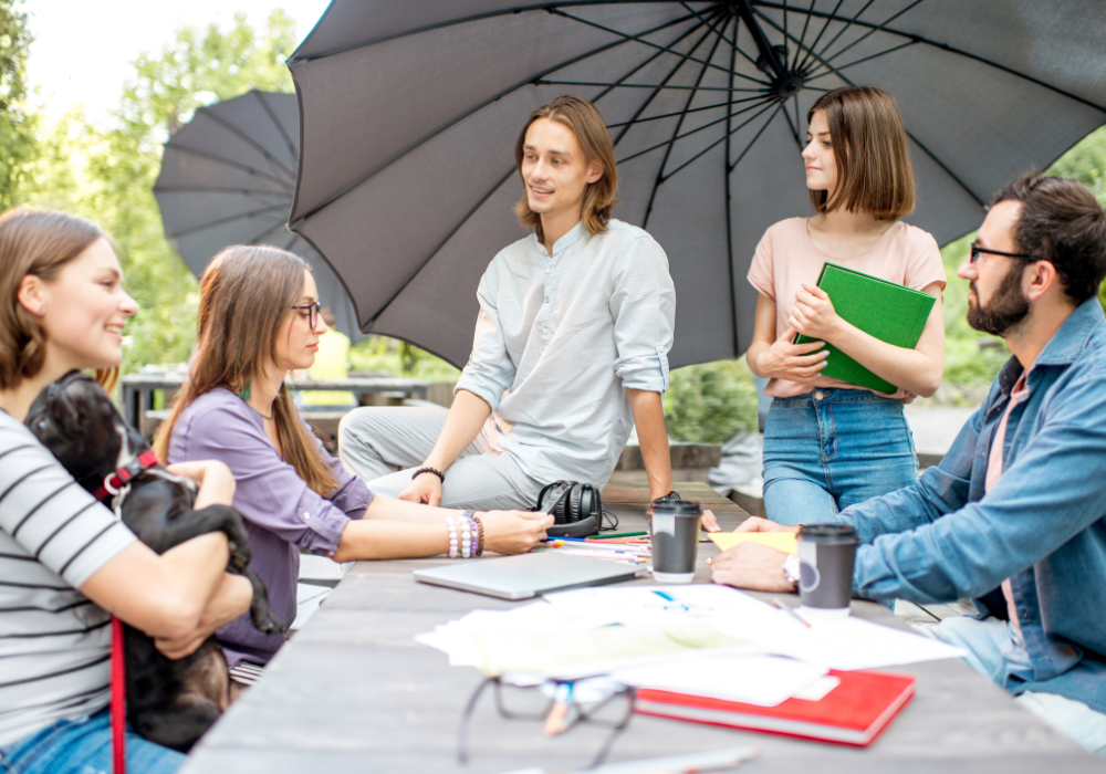 picnic-table-students-gallery Students sitting at a picnic table talking about their study abroad expectations