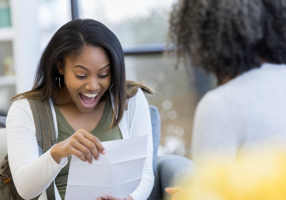 student-excited-paper-gallery Student excited about their acceptance to a study abroad program