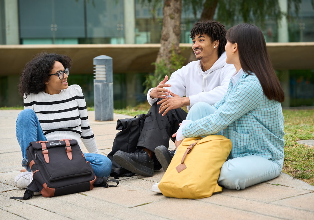 students-ground-chatting-gallery Students sitting on the ground outside chatting