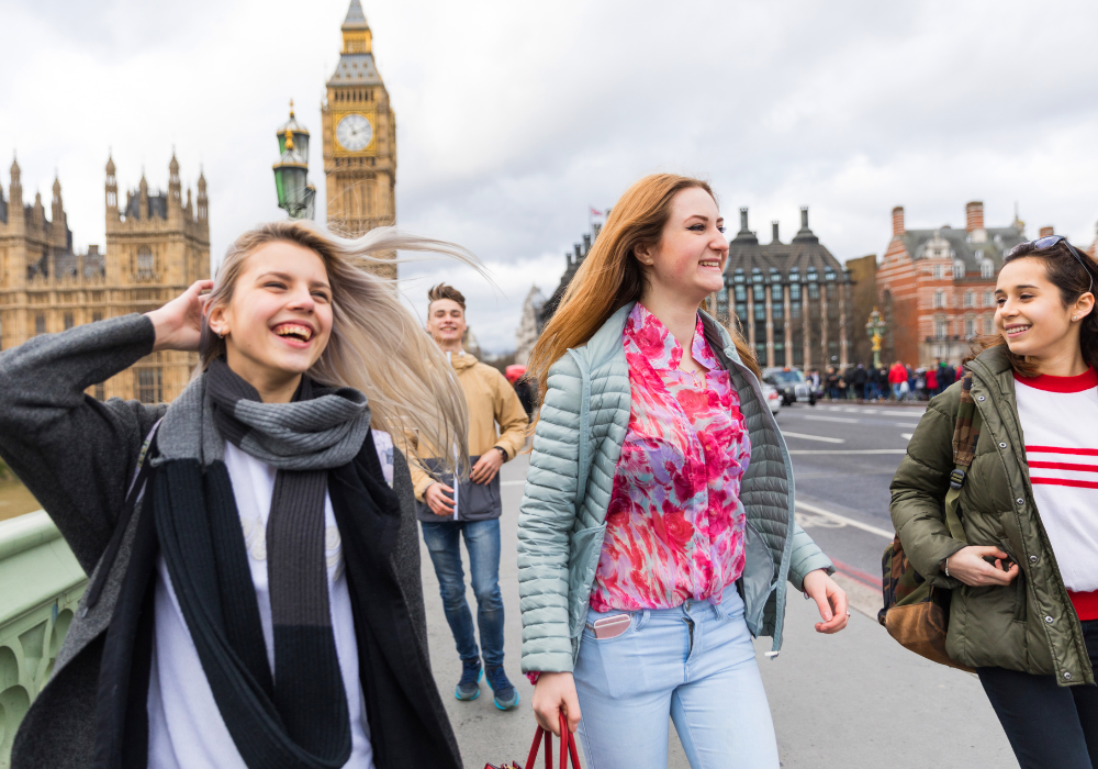 students-smiling-big-ben-gallery Students smiling and talking near Big Ben