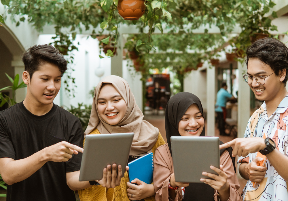 students-walking-and-talking-gallery Students using language translating app to help communicate