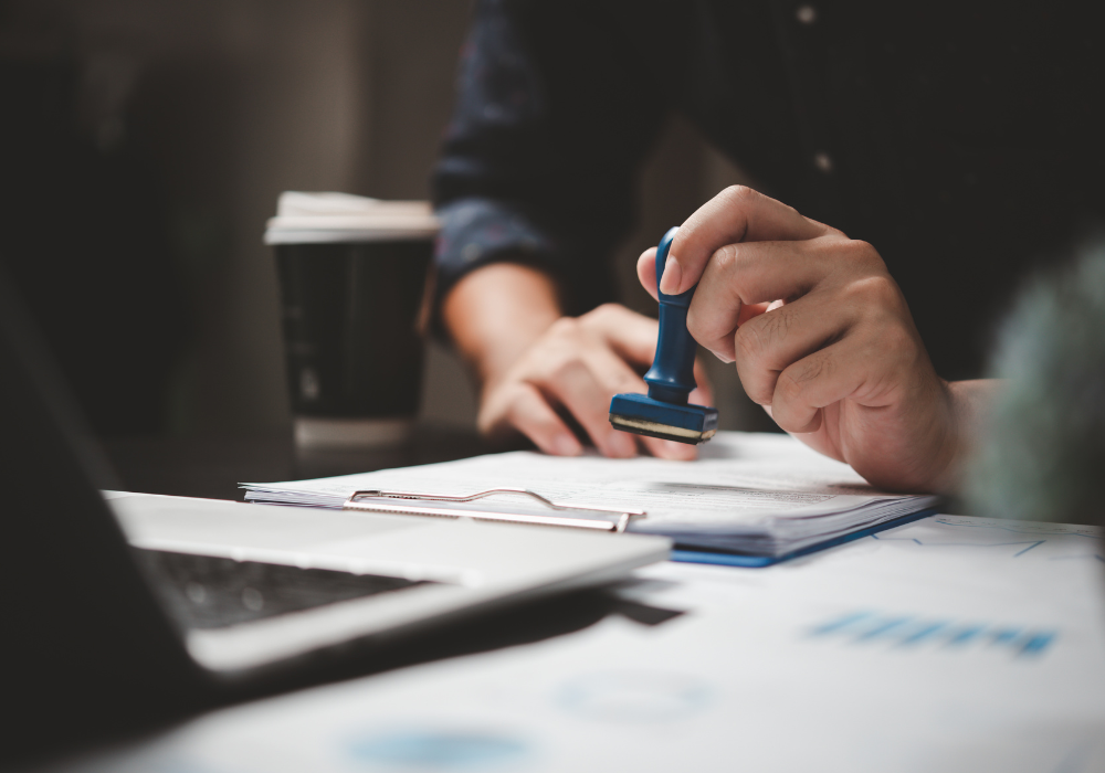 visa-stamped-gallery Visa being stamped for approval