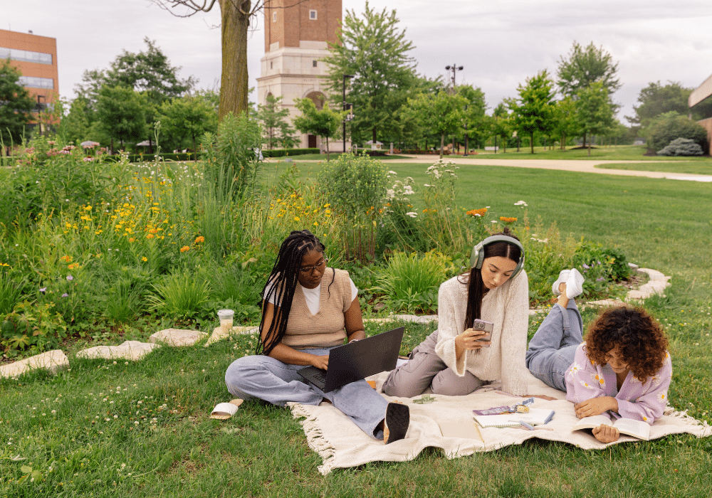 Students studying outdoors while abroad