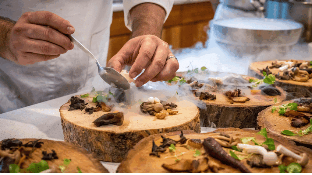 Culinary student studying abroad preparing an international dish.